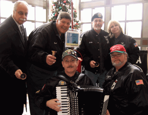 Photo of Tom Brown and his Vietnam Veterans of America Chapter 528 Plymouth/Canton, Michigan buddies helping out for the Salvation Army 2009